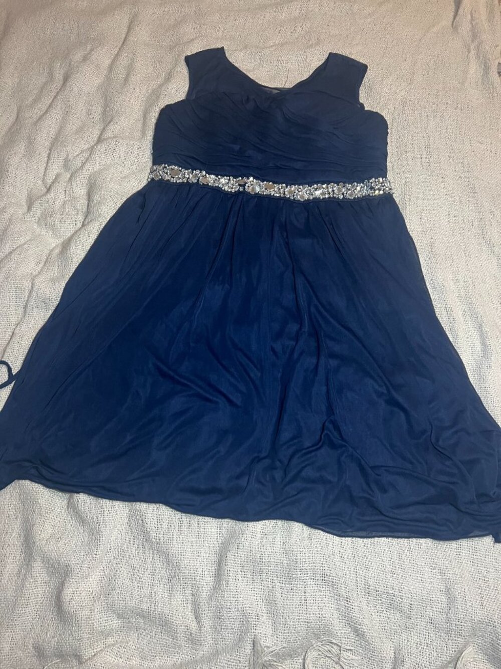 Sleeveless navy-blue special occasion dress by the brand Speechless Kids